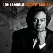 Johnny Mathis - The Essential 01 - Na Escolha de 15 álbuns musicais e Video, o Pen-Drive será grátis...Aproveite!